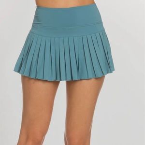 Gold hinges pleated tennis skirt in teal size large